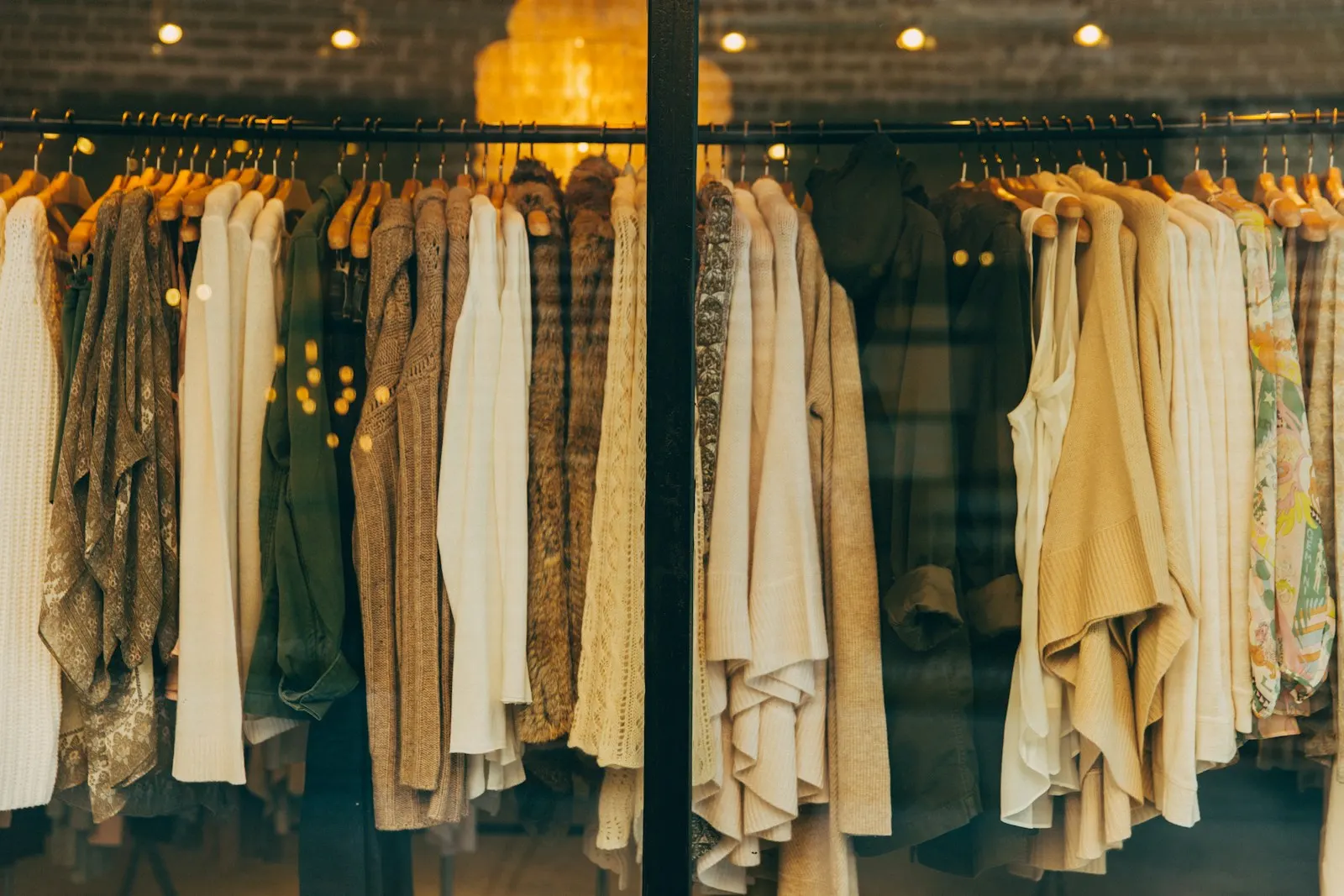 Clothes hanging on shop rails