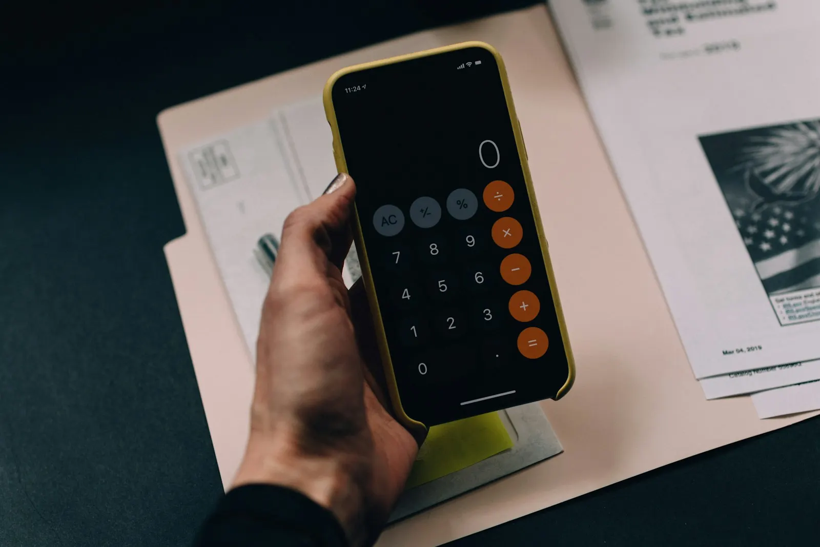 Calculator on financial paperwork